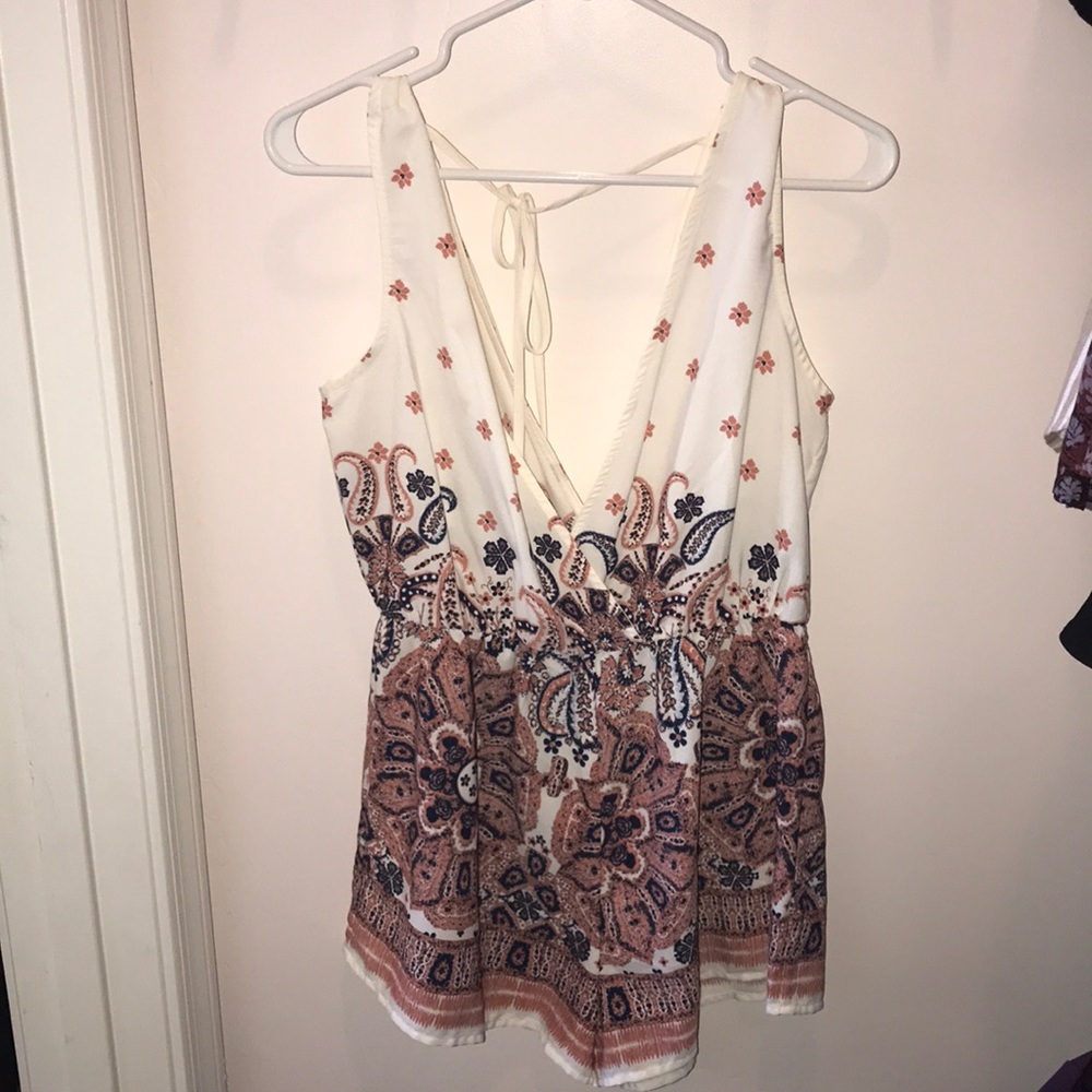 white with floral design romper